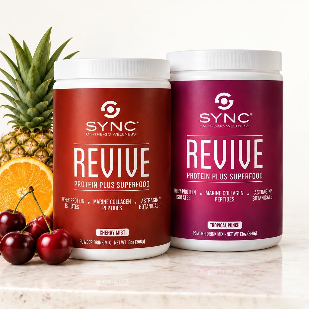 SYNC REVIVE Cherry Mist and Tropical Punch tubs with pineapple, orange and cherries